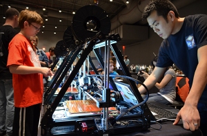 Michael Cao with an IC3D RepRap at the Columbus Mini Maker Faire 2012
